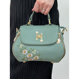 Embroidered crossbody bag in green with PU finish (British brand)