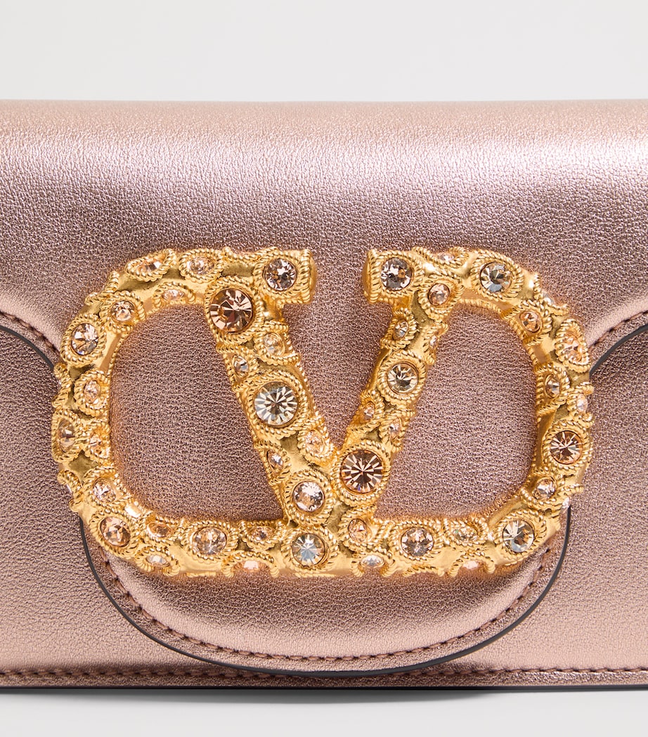 Valentino Garavani Small Leather Locò shoulder bag, imported from the UK
