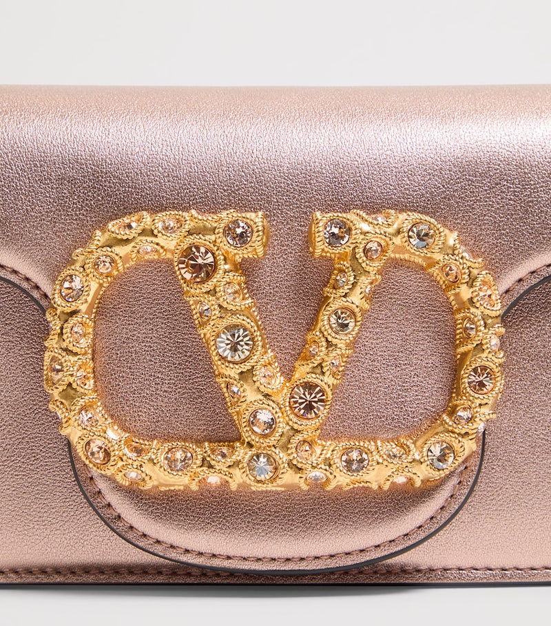 Valentino Garavani Small Leather Locò shoulder bag, imported from the UK