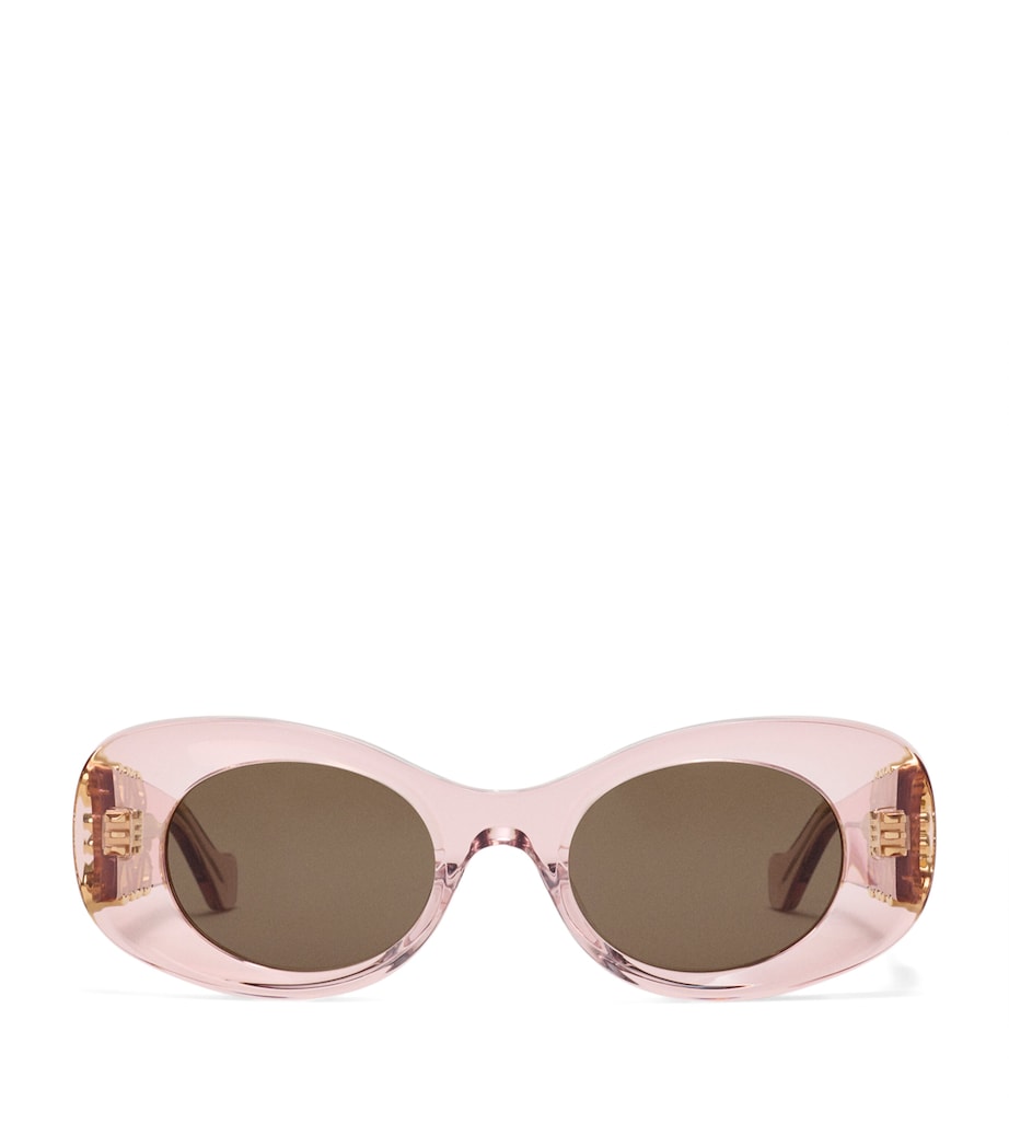 LOEWE oval sunglasses with bevelled acetate frame, imported from the UK