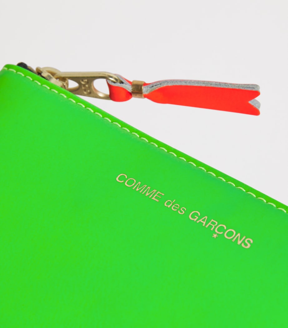 Comme des Garçons Super Fluo small leather pouch - British product