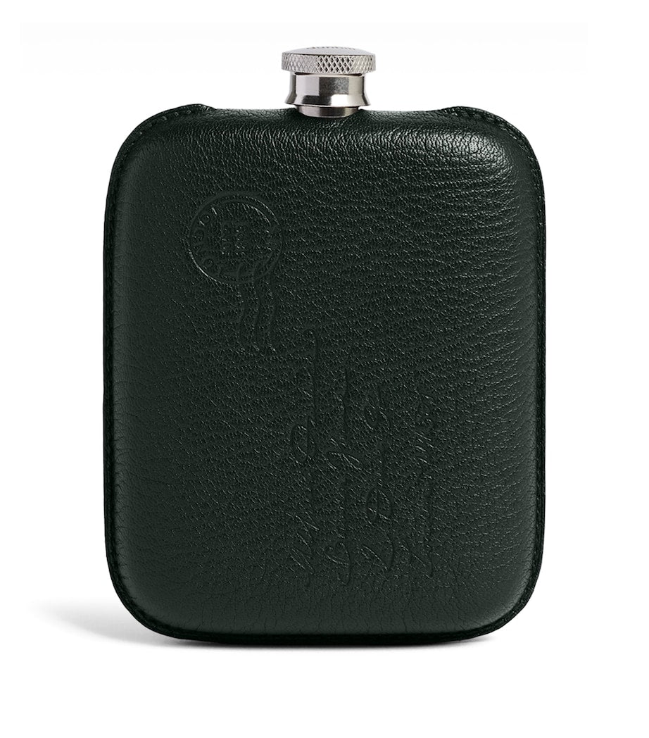 Dunhill leather-wrapped flask (British brand)