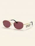 Burberry oval sunglasses in light gold/red, UK version