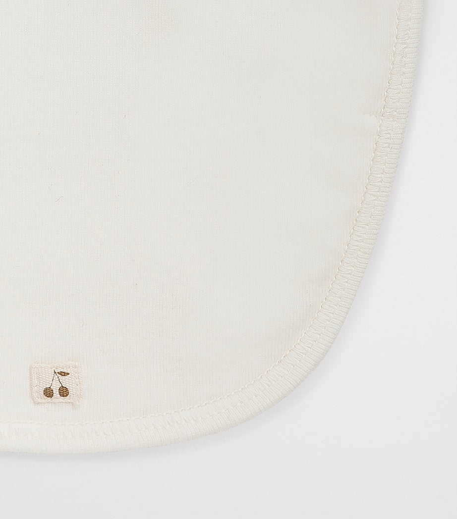 Bonpoint bib with cherry logo (British brand)