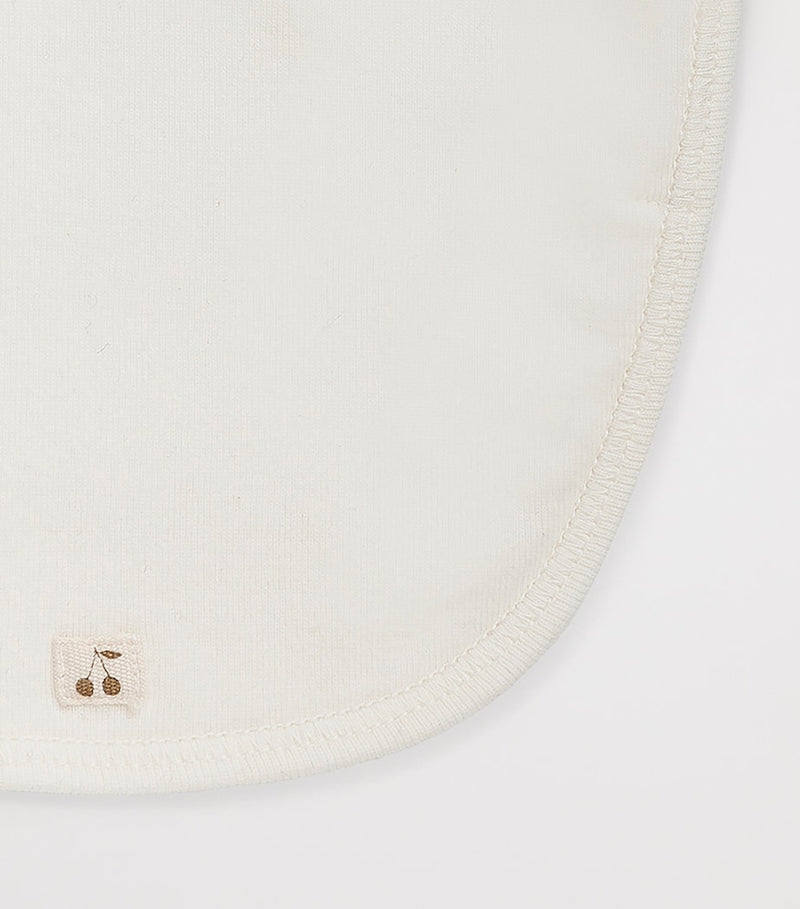 Bonpoint bib with cherry logo (British brand)