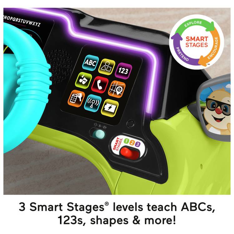 Fisher Price Laugh & Learn Sit & Steer Driver activity toy (British brand)