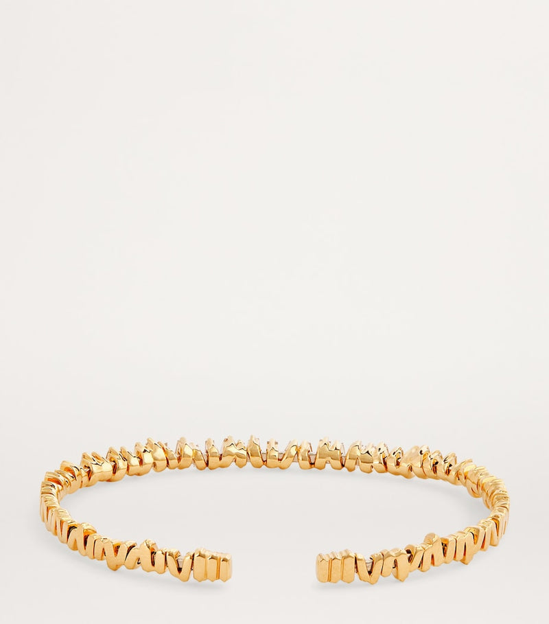 Suzanne Kalan Classic bangle with baguette diamonds in yellow gold (British brand)