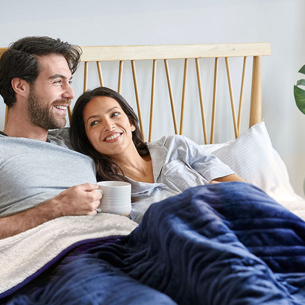 Cosi Home navy reversible fleece sherpa heated throw, imported from the UK
