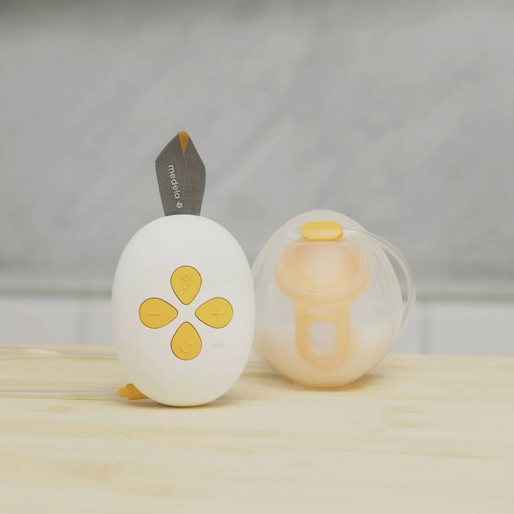 Medela Solo hands-free breast pump - British product