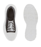 Alexander McQueen Tread Slick sneakers, imported from the UK