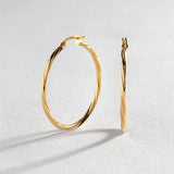 Revere 9ct gold twist creole hoop earrings, UK version