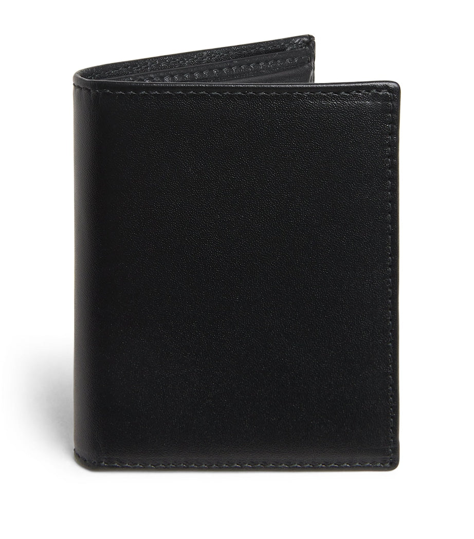 Comme Des Garçons leather wallet with card slots (British brand)