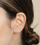 Astrid & Miyu white gold topaz illusion huggie earrings, imported from the UK