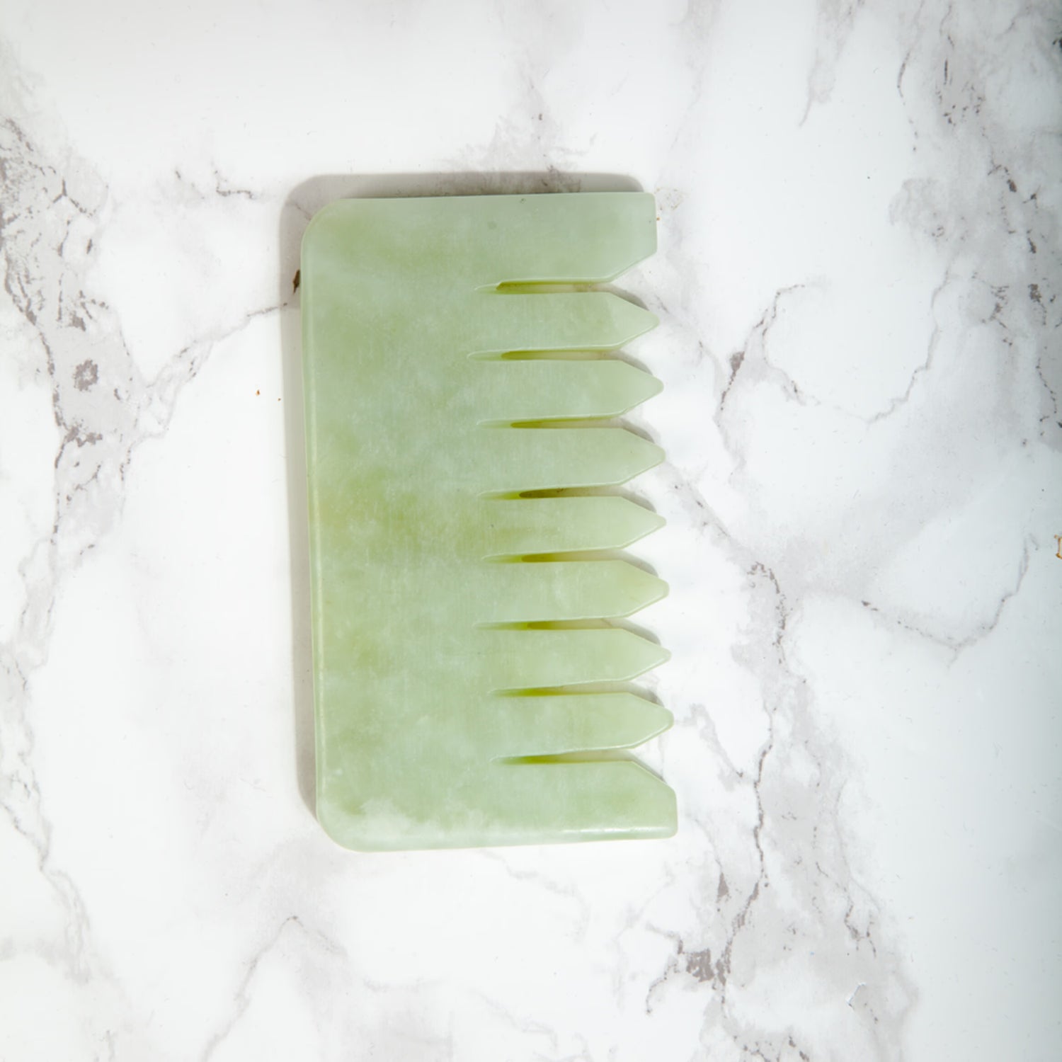 White Lotus jade gua sha comb, imported from the UK