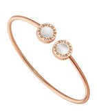 Bvlgari rose gold bangle with mother-of-pearl, imported from the UK