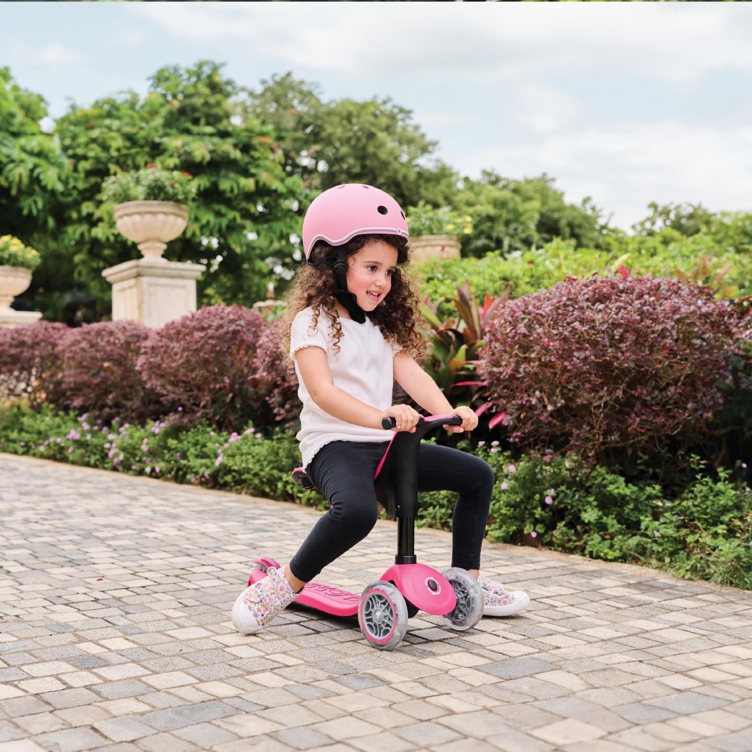 Globber Go Up Sporty Lights 360 deep pink scooter, imported from the UK