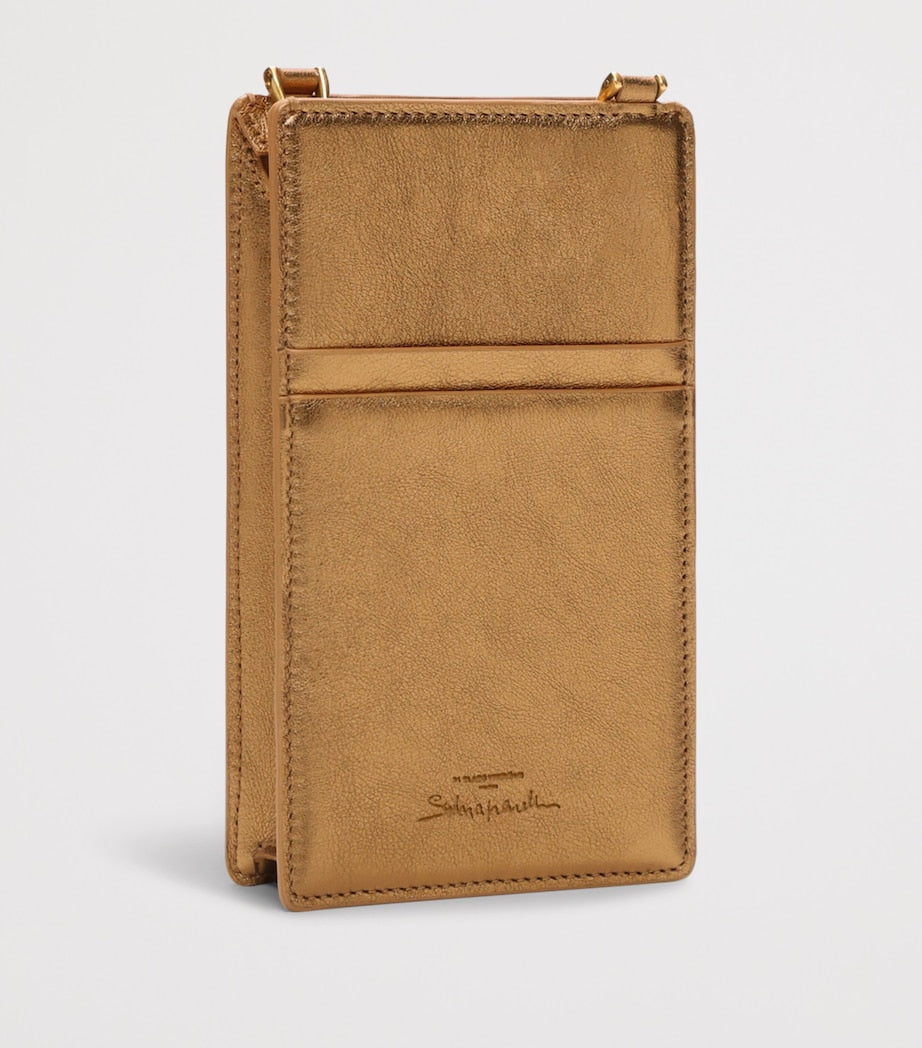 Schiaparelli leather face phone pouch, UK version