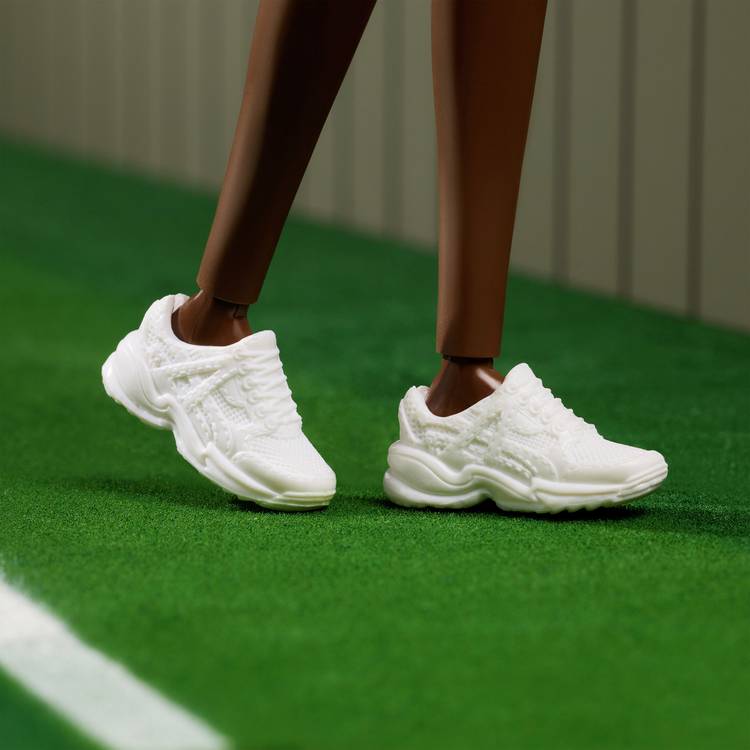 Barbie Venus Williams fashion doll with tennis racket, UK version