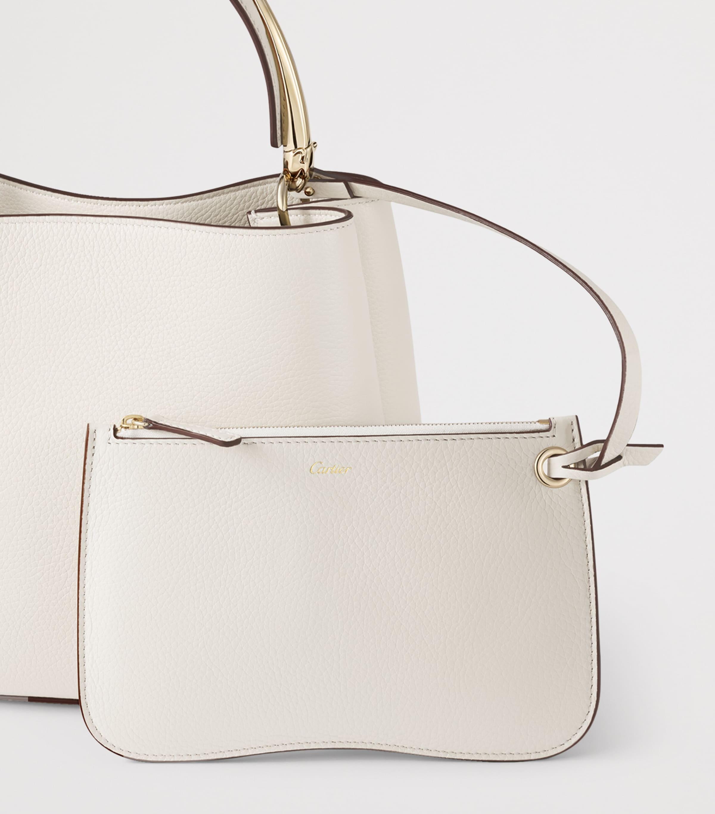 Cartier small leather top-handle bag with panther motif, UK version
