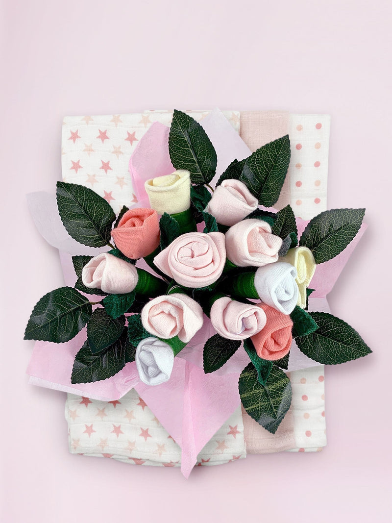 سلة هدايا ترحيبية وردية من Babyblooms مع دمية فرانكي بير الناعمة - منتج بريطاني