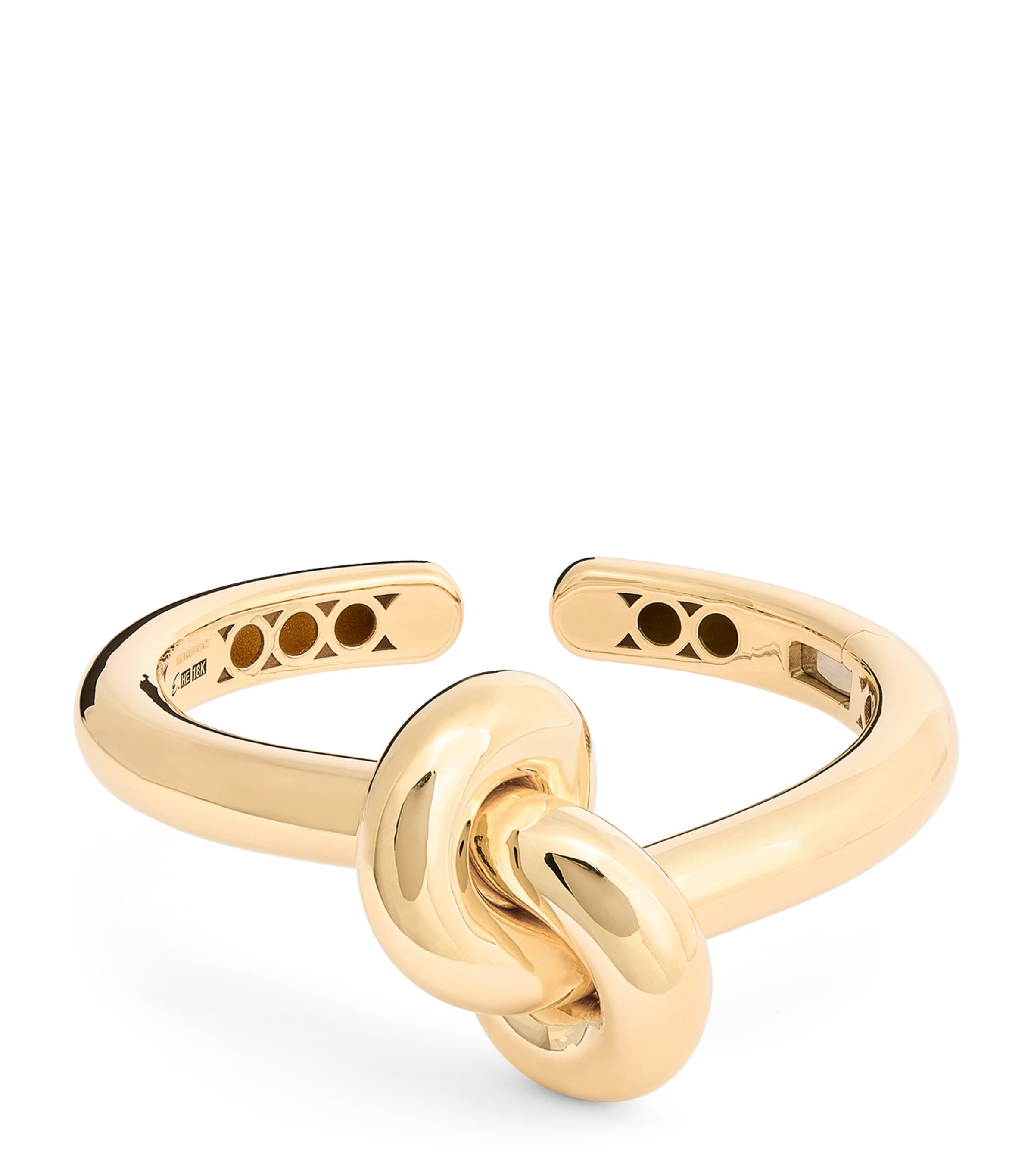Engelbert yellow gold knot bangle with circular detailing - British product