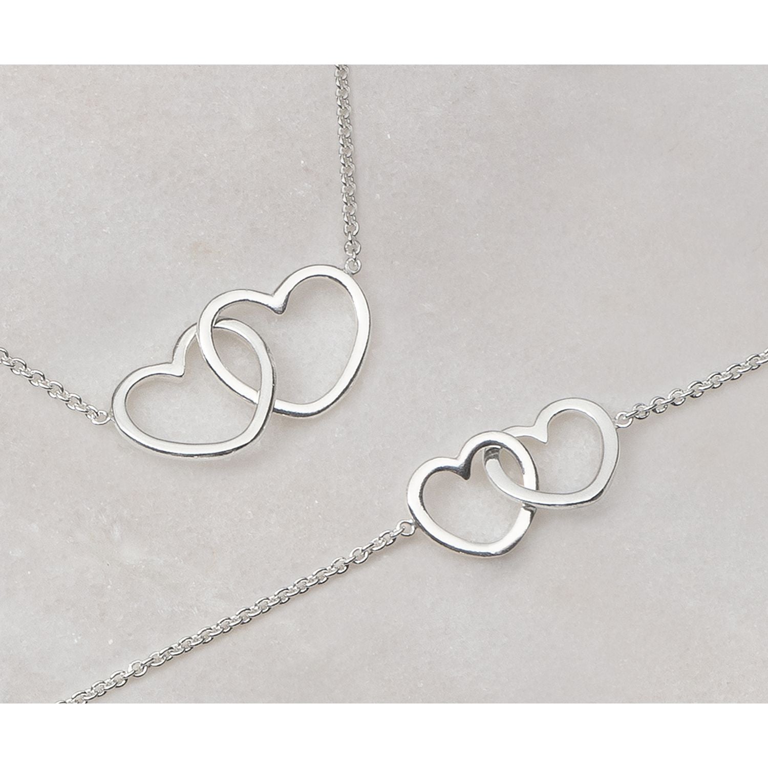 Revere heart cubic zirconia earrings, imported from the UK