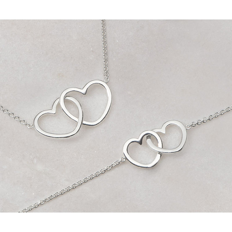 Revere heart cubic zirconia earrings, imported from the UK
