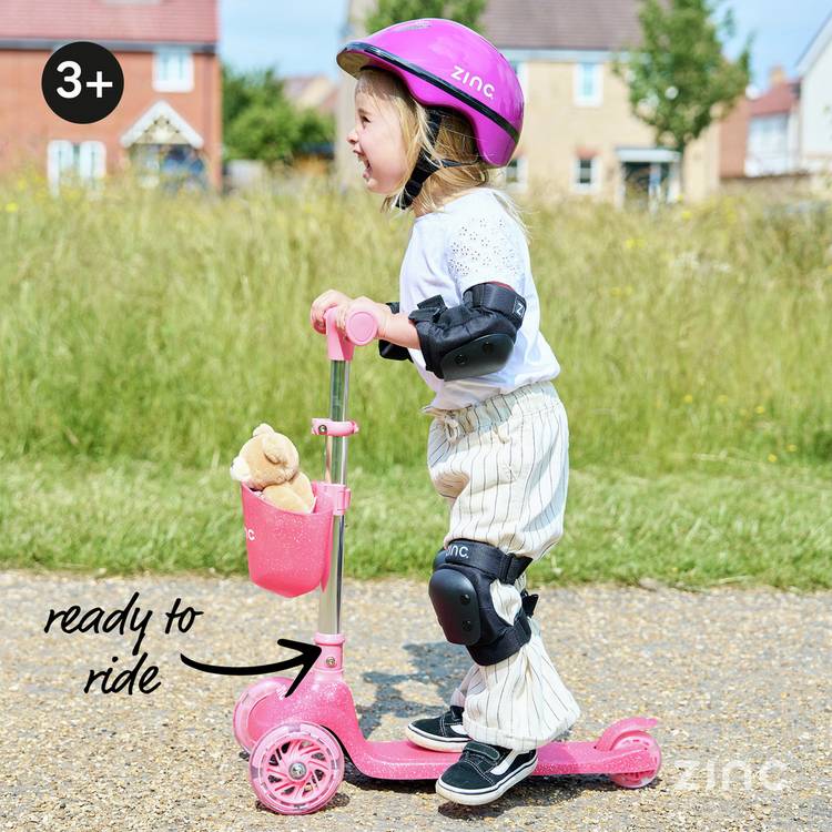 Zinc Jelly Glitter Pink Tri Scooter with light-up wheels, imported from the UK.