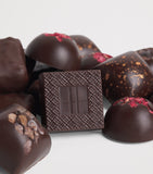 Harrods dark chocolate 15-piece collection with raspberry, caramel, and orange flavours 125g, UK version