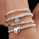 Lipsy silver heart charm stretch bracelet (British brand)
