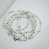 Lipsy silver heart charm stretch bracelet (British brand)