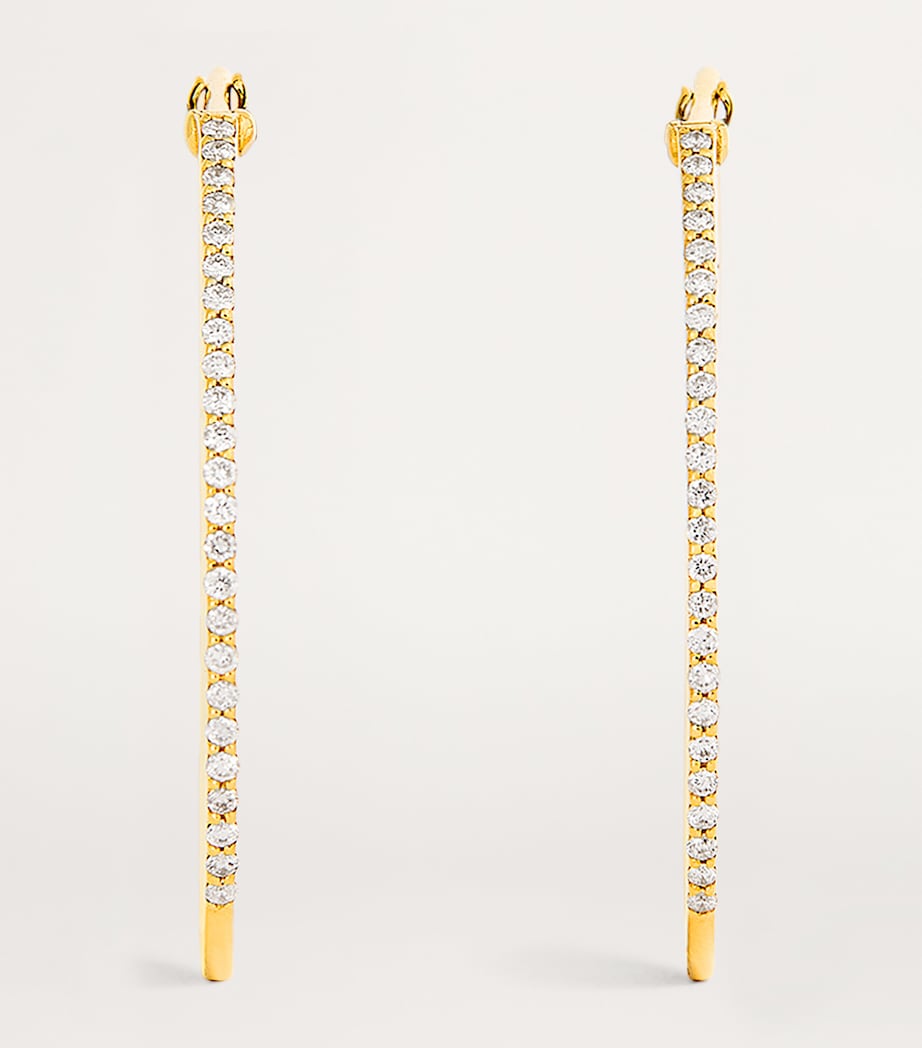 L'Atelier Nawbar Cosmic Rays earrings in 18kt yellow gold - British product