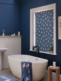 Blue blackout roller blind with puffin print, imported from the UK