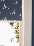 Blue blackout roller blind with puffin print, imported from the UK