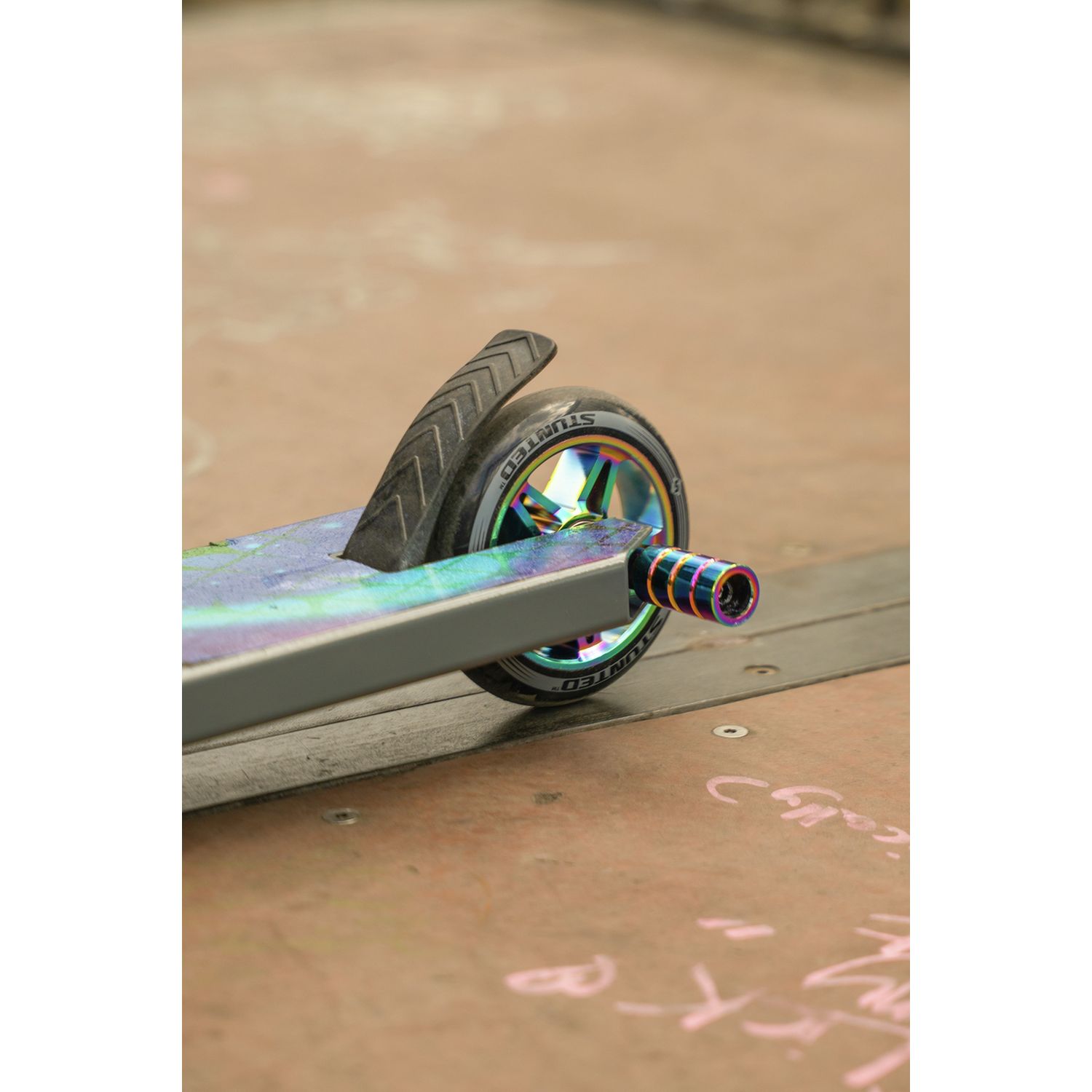 Stunted Flare stunt scooter with aluminium deck and neochrome details (British brand)