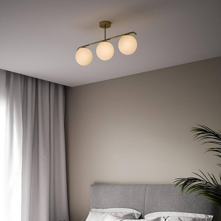 Nordlux Grant pendant light in brass with three glass domes - British product