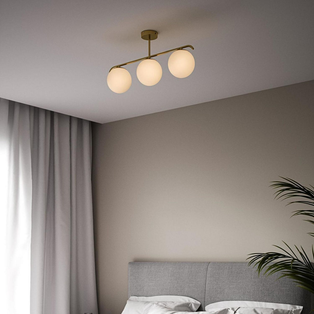 Nordlux Grant pendant light in brass with three glass domes - British product