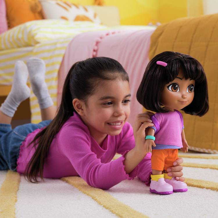 Dora 12-inch Sing & Explore doll with backpack (British brand)