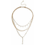 Liars & Lovers necklace gold tone pearl pendant multilayered, UK version