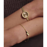 Olivia Burton gold-plated bee bracelet, UK version