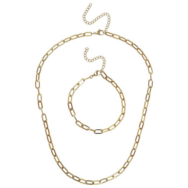 Liars & Lovers gold tone paperlink set, imported from the UK