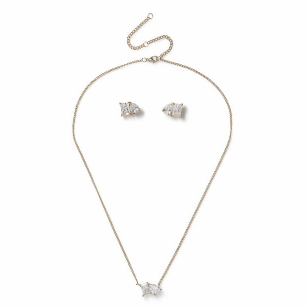 Liars & Lovers gold tone necklace and earring set, imported from the UK