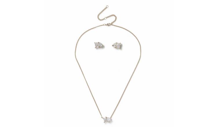Liars & Lovers gold tone necklace and earring set, imported from the UK