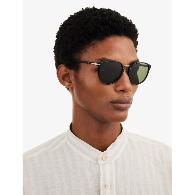 Persol oval-frame sunglasses with tinted lenses (British brand)