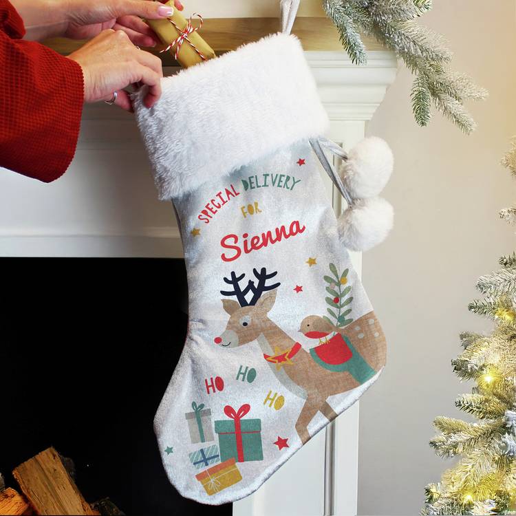 Personalised reindeer Christmas stocking, soft velvet, British brand