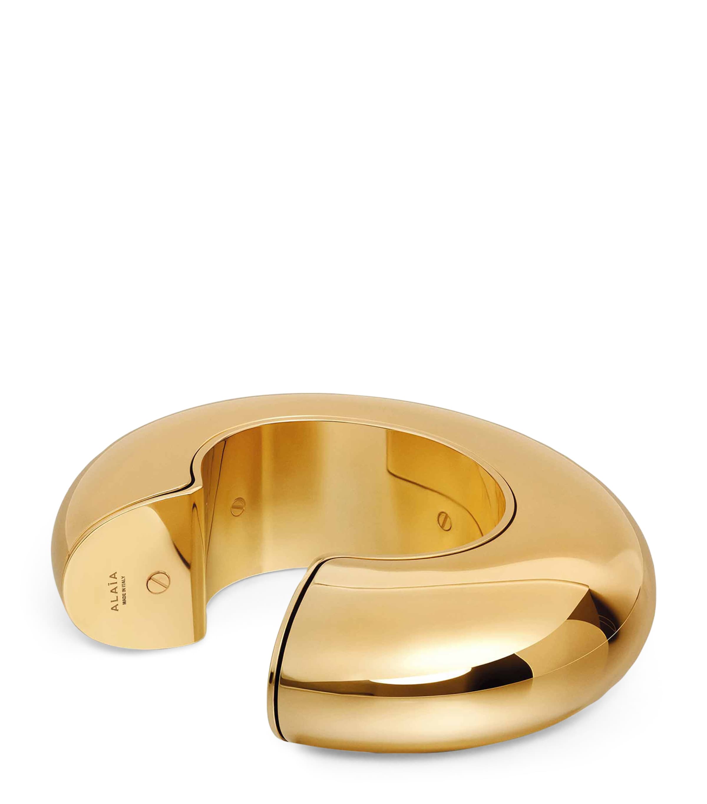 Alaïa bumper cuff gold-tone aluminium, UK version
