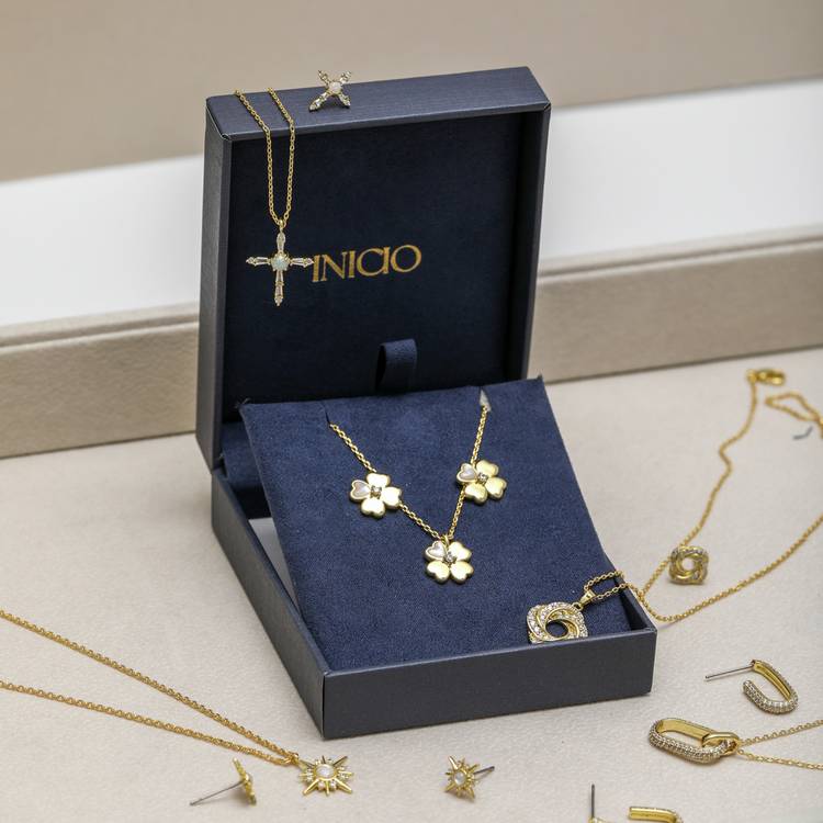 Inicio gold plated clover jewellery set with cubic zirconia, imported from the UK