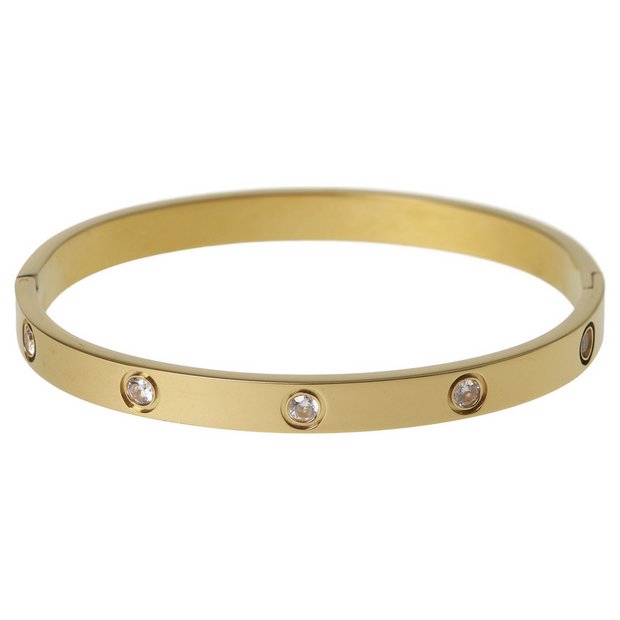 Liars & Lovers gold tone crystal hinged bangle, imported from the UK