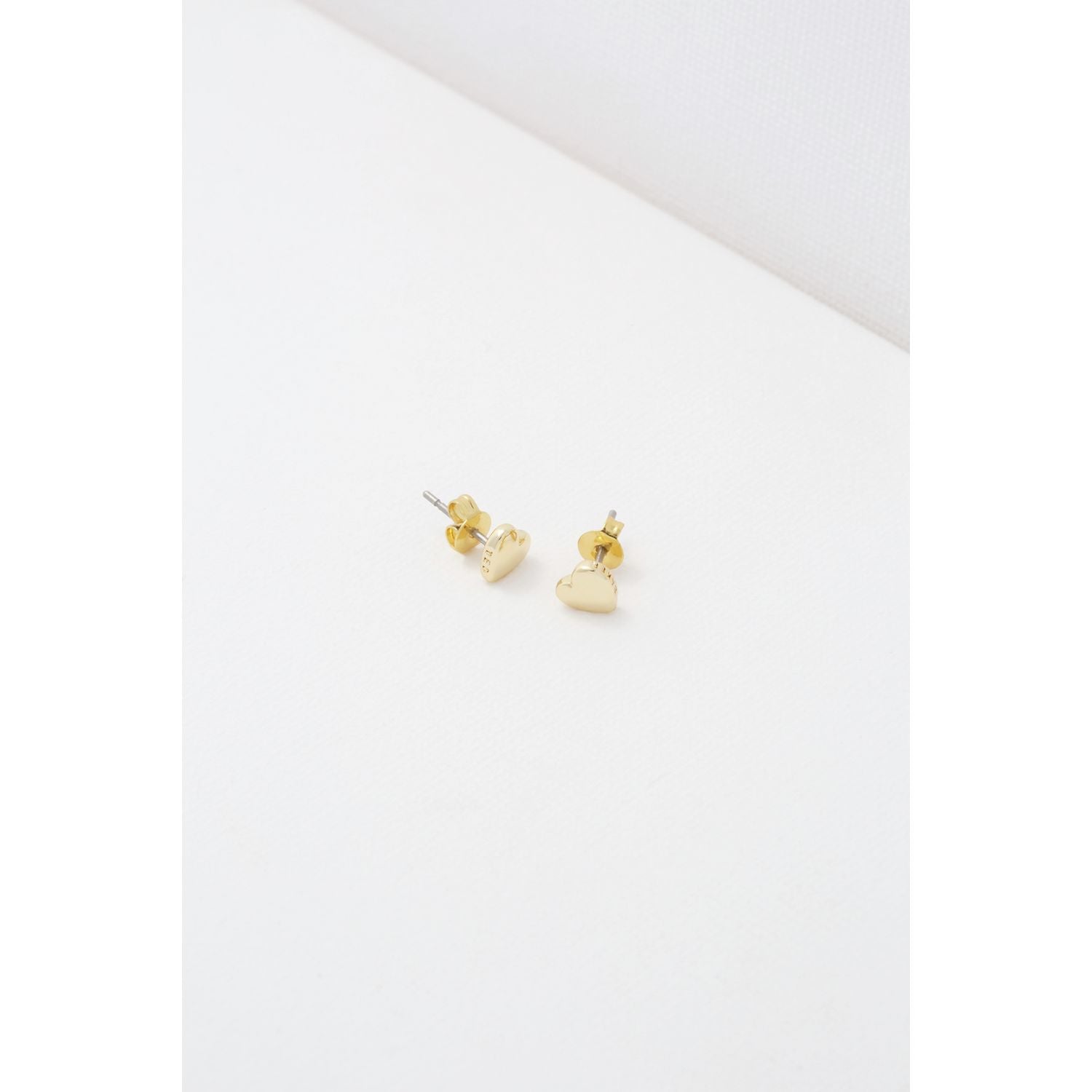 Ted Baker tiny heart stud earrings gold tone jewellery imported from the UK