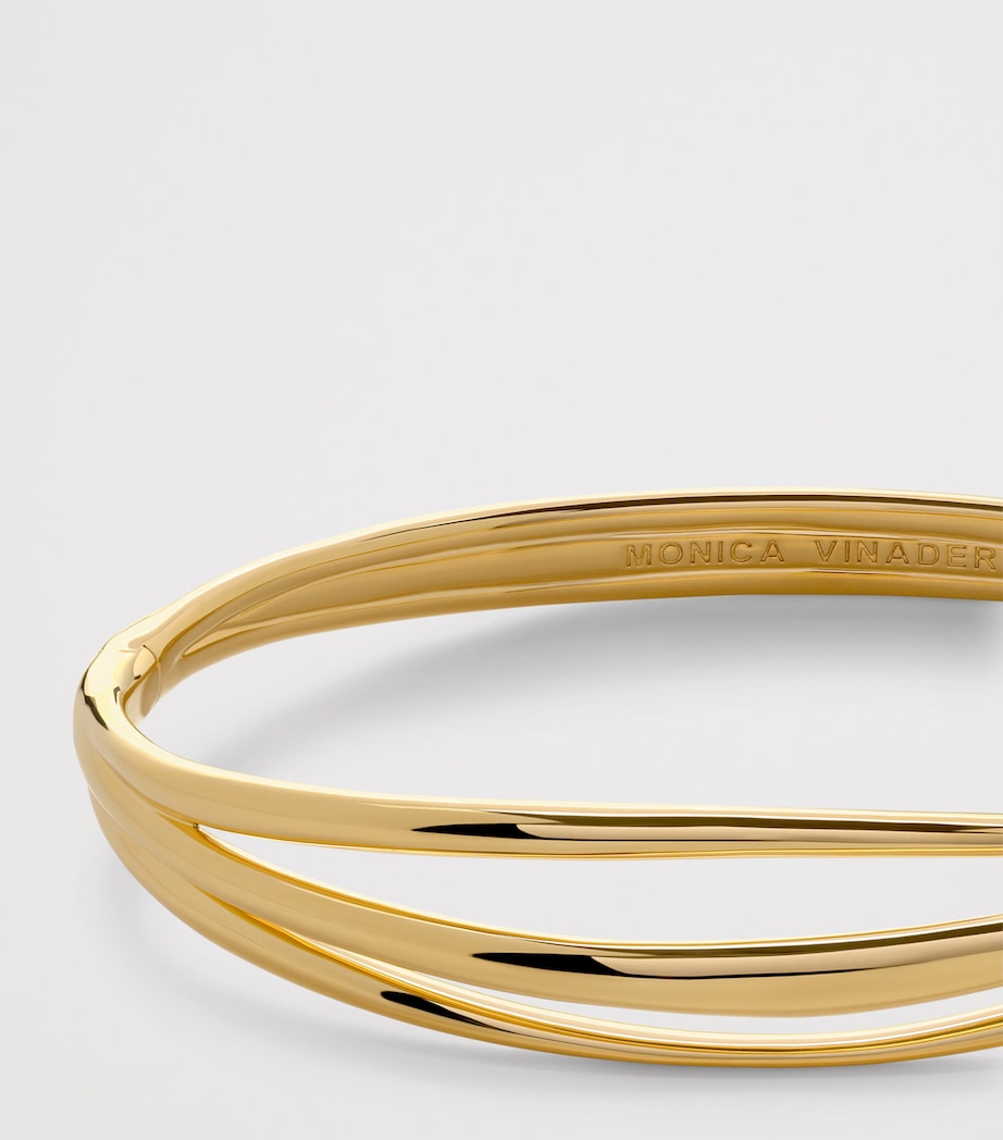Monica Vinader gold vermeil Nura Wrap bangle, imported from the UK